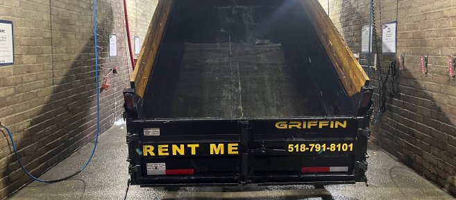 15 yard dumpster rental on a residential driveway